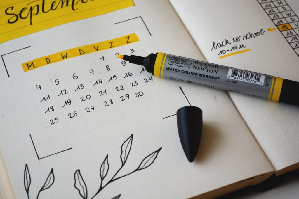 bullet journal with marker pen - one of the ultimate open source productivity apps.